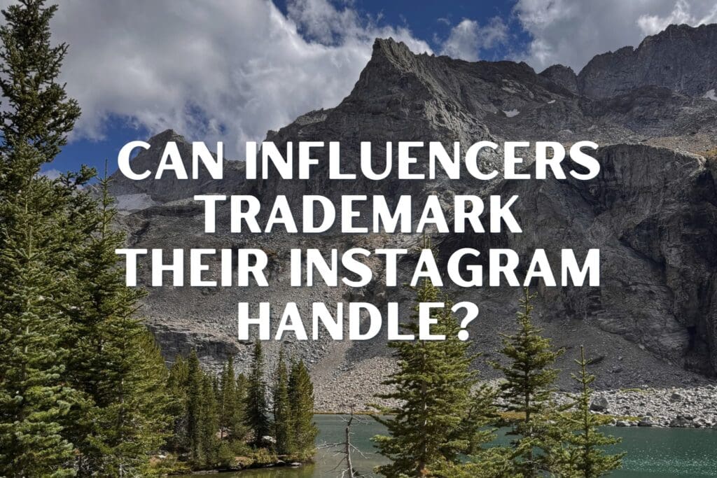 A mountain and alpine lake with the text "can influencers trademark their instagram handle?" overlayed.